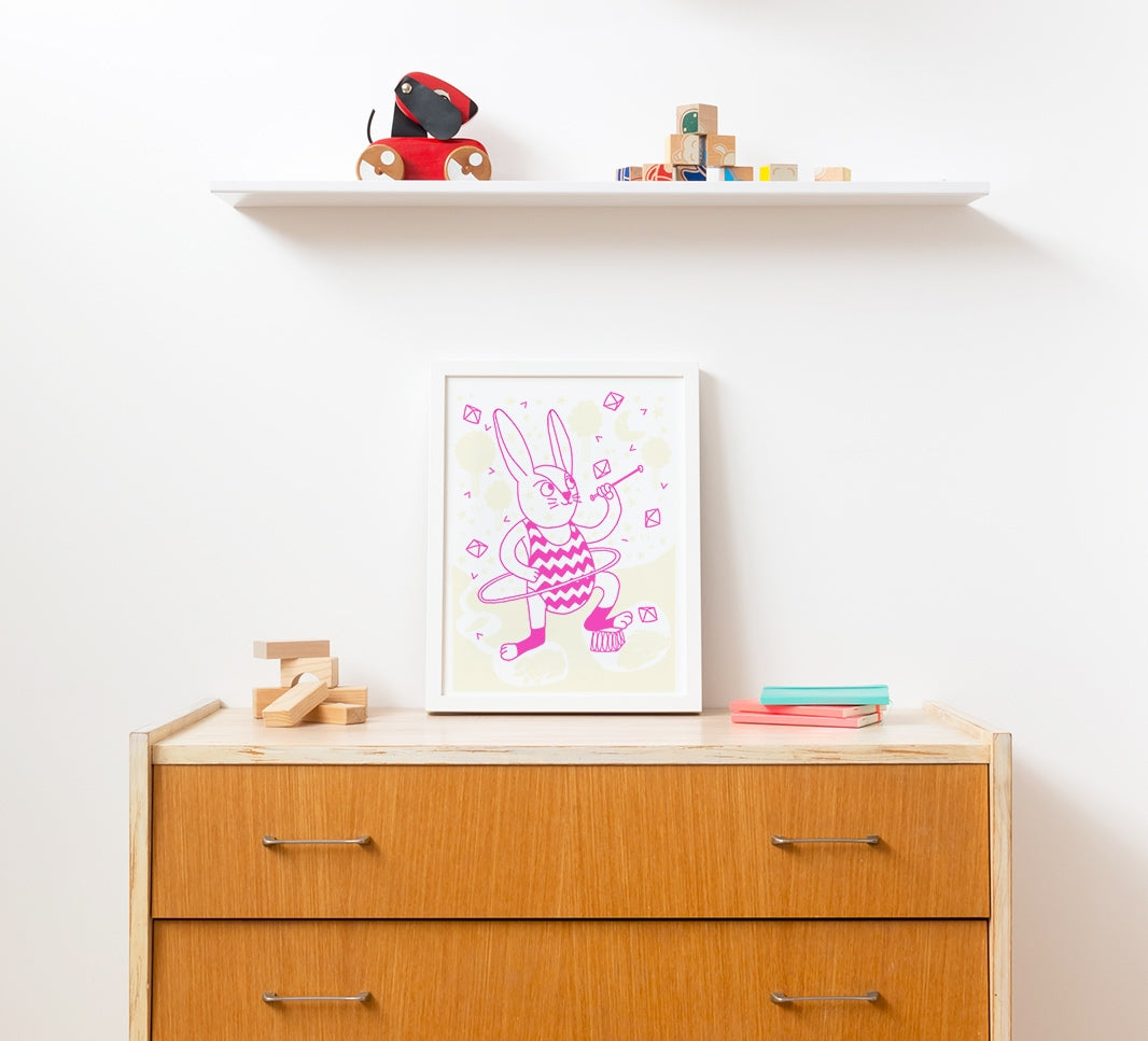 Glow in the dark bunny poster set against the wall
